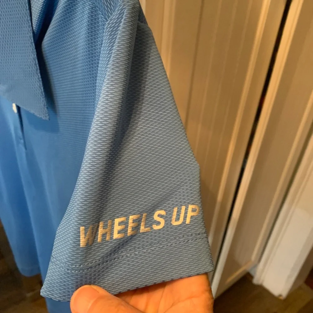 Nike dri fit golf shirt with Wherls up logo‎ . Worn once